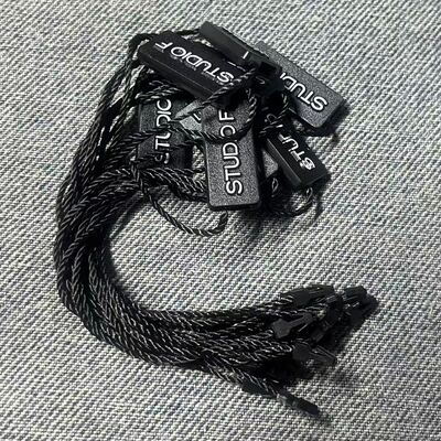 Plain Black Hang Tag String Quantity 100 Pieces Thickness 0.2mm Suitable for in Apparel Accessories and Product Packaging
