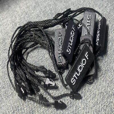 Plain Black Hang Tag String Quantity 100 Pieces Thickness 0.2mm Suitable for in Apparel Accessories and Product Packaging
